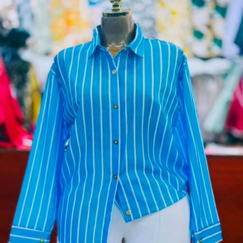 39f6e6e4-2467-4ae0-84bb-7cc68ad477dd blue shirt