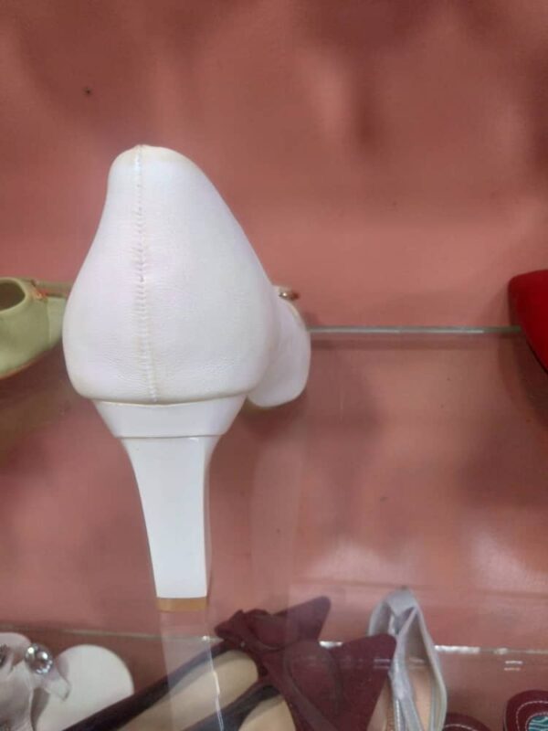 high hills white shoes